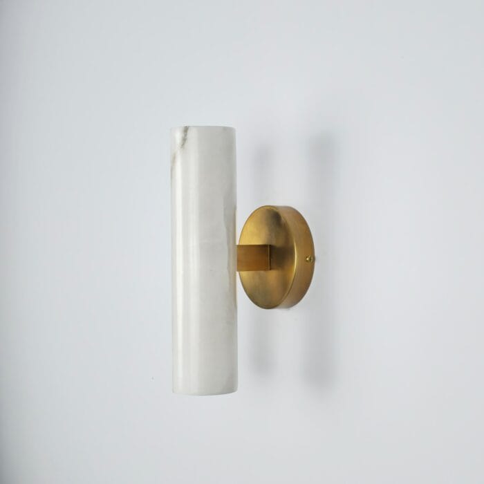 Premium Alabaster Wall Light featuring a sleek, vertical cylindrical alabaster stone shade mounted on a polished brass base, creating a modern and luxurious lighting aesthetic for contemporary interior spaces.