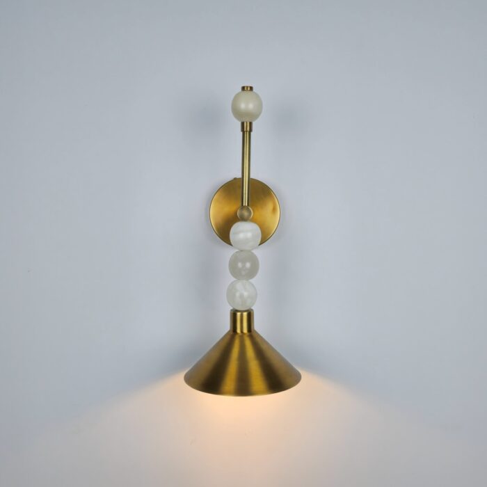 Decorative Wall Light, Modern brass and white cone-shaped wall sconce lamp emitting warm light.