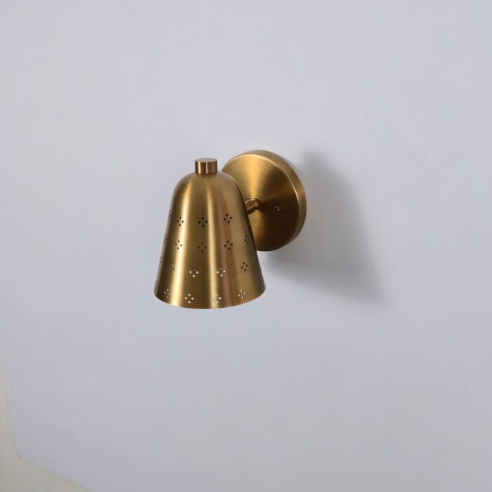 Minimalist wall light with cone shade