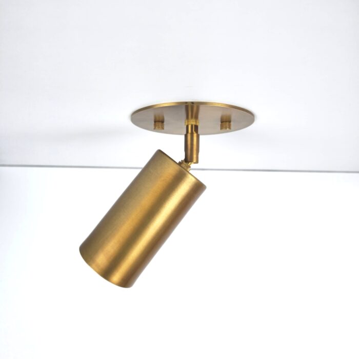 Modern handcrafted Spotlight, brass finish adjustable spotlight with circular ceiling plate.